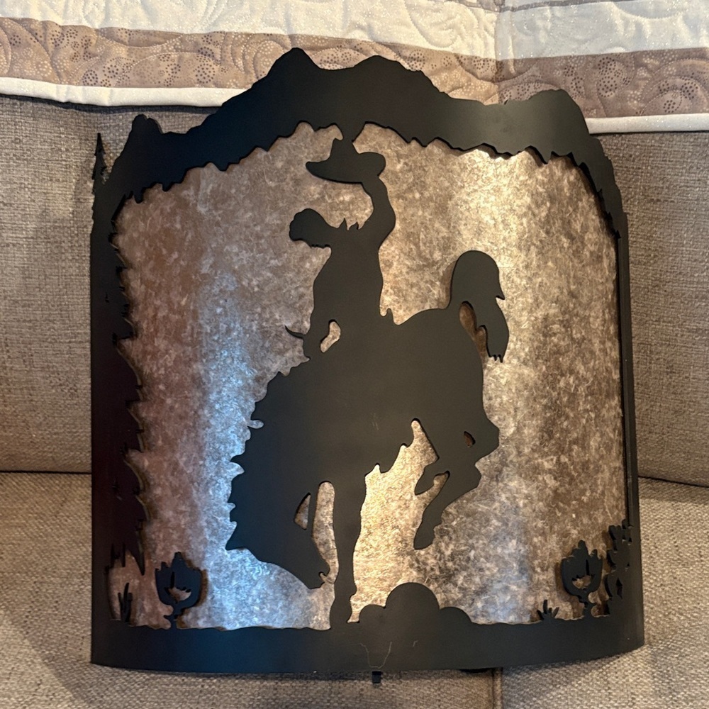 New west furniture -Cody, Wyoming handmade Western Cowboy Metal/mica wall sconce